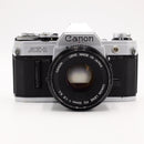 Canon AE-1 35mm SLR Film Camera w/ 50mm Lens (Silver) *USED*