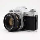Canon AE-1 35mm SLR Film Camera w/ 50mm Lens (Silver) *USED*