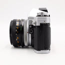 Canon AE-1 35mm SLR Film Camera w/ 50mm Lens (Silver) *USED*
