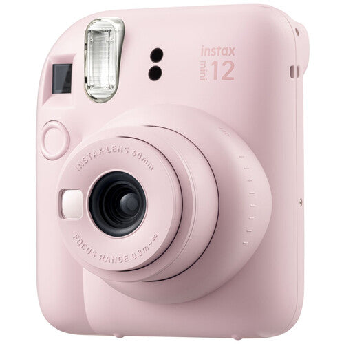 Pink Instax Mini 9 with film and case top